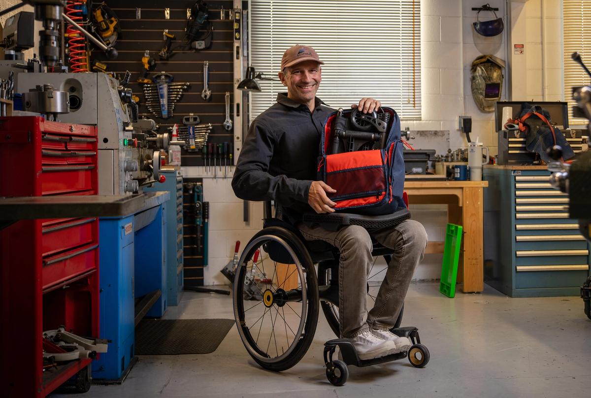 Christian Bagg, founder and chief technology officer of Bowhead Corp, demonstrates the Nano, a collapsible wheelchair that folds to fit inside a backpack, at the companyâs warehouse in Calgary on Tuesday, Oct. 27, 2026.