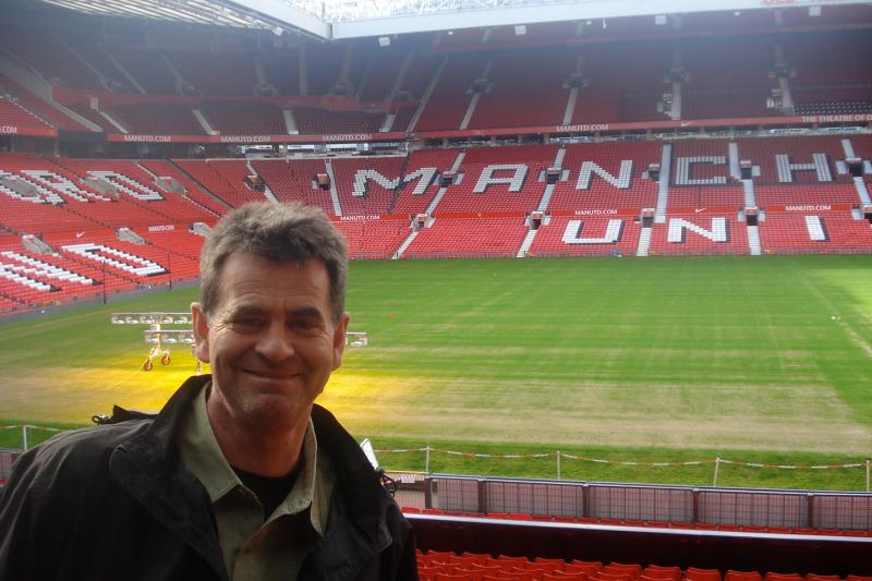 Tim Swartz in front of the Manchester United soccer pitch