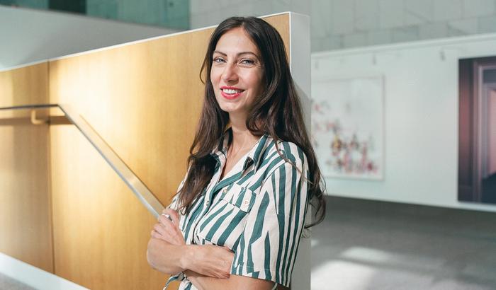 A portrait of Indra Kubicek, CEO of Digital Moment