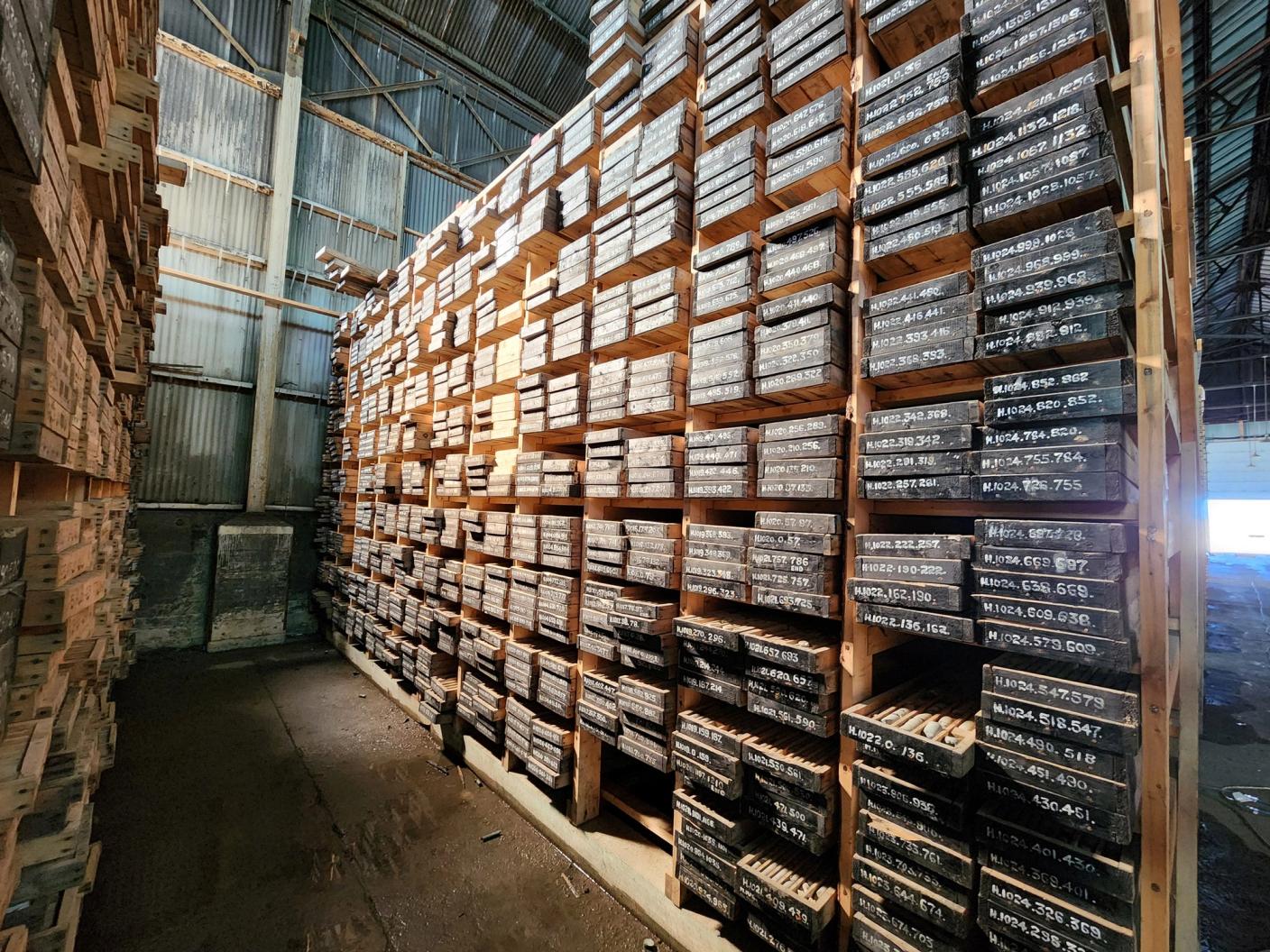The inside of a drill core library, showing shelves of drill core samples