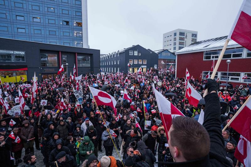 A crowd walk to the US consulate to protest against Trump's policy towards Greenland in Nuuk, Greenland, Saturday, Jan. 17, 2026.