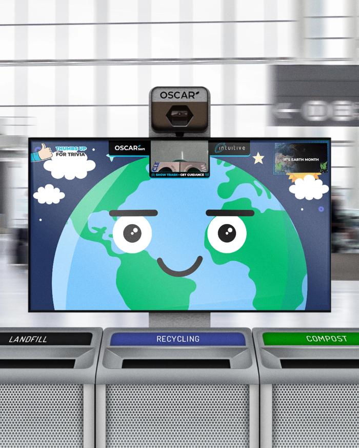 A photo illustration of Oscar Sort AI trash recycling, showing a yellow smiley face and camera on a screen above a set of three trash cans labelled "landfill" "recycling" and "compost"