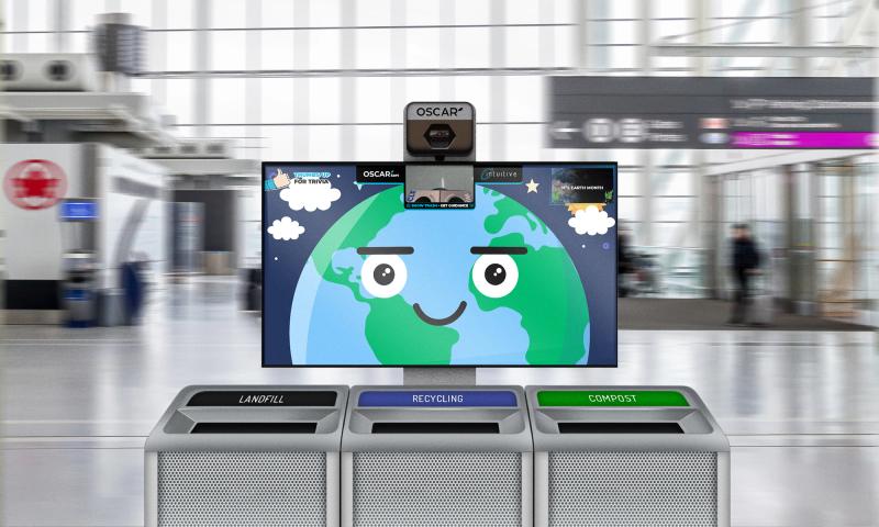 A photo illustration of Oscar Sort AI trash recycling, showing a yellow smiley face and camera on a screen above a set of three trash cans labelled "landfill" "recycling" and "compost"