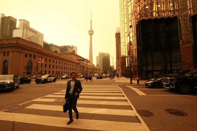 The skies above Toronto on July 15, 2026. Wildfire smoke is a toxic mix of fine particulate matter called PM 2.5 that can have both short-term and long-term health effects.