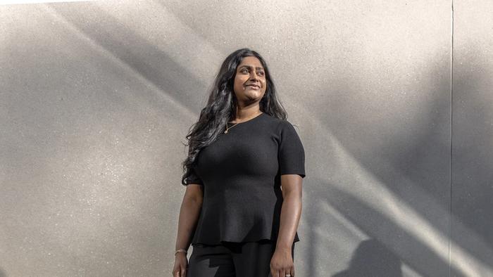 Nivatha Balendra, founder and CEO of Dispersa, standing outside her laboratory in Montreal, QC.