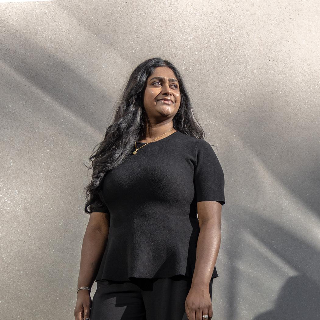 Nivatha Balendra, founder and CEO of Dispersa, standing outside her laboratory in Montreal, QC.