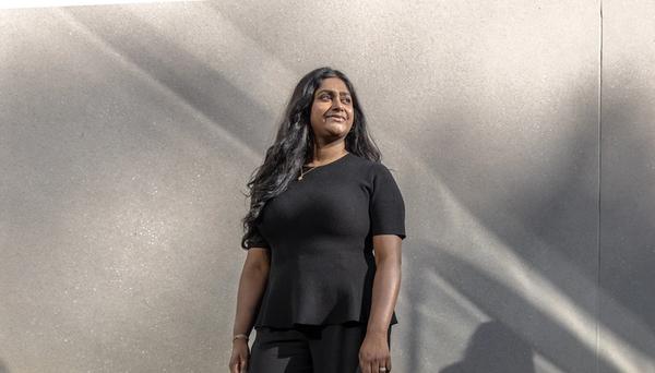 Nivatha Balendra, founder and CEO of Dispersa, standing outside her laboratory in Montreal, QC.