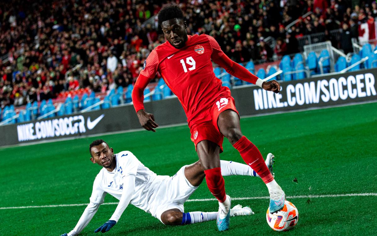 Alphonso Davies playing for Canada's national team vs Honduras at BMO Field in 2023