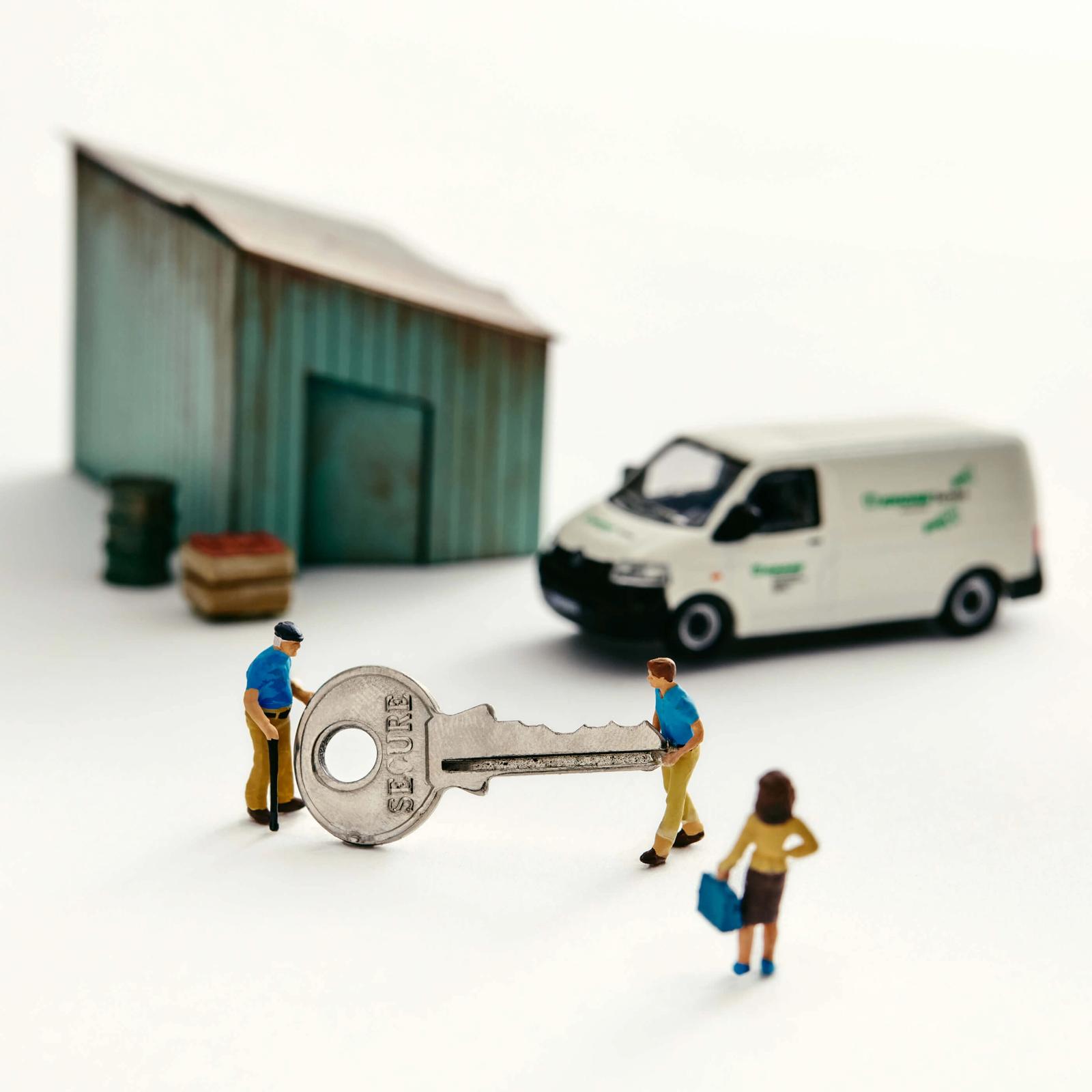 a photo illustration of a miniature shed with a van and two people holding a giant key with a woman looking on for a piece on how young people are taking over family businesses in Canada