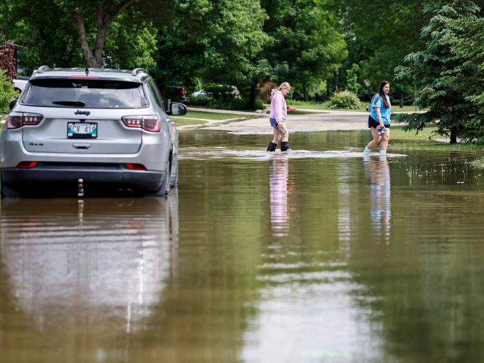 Flooding in Stonewall, Man., north of Winnipeg, on June 10, 2026. The night before, Stonewall saw 255 millimetres of rain.