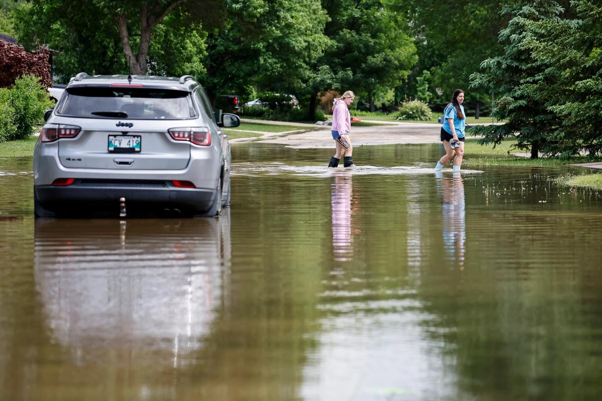 Flooding in Stonewall, Man., north of Winnipeg, on June 10, 2026. The night before, Stonewall saw 255 millimetres of rain.