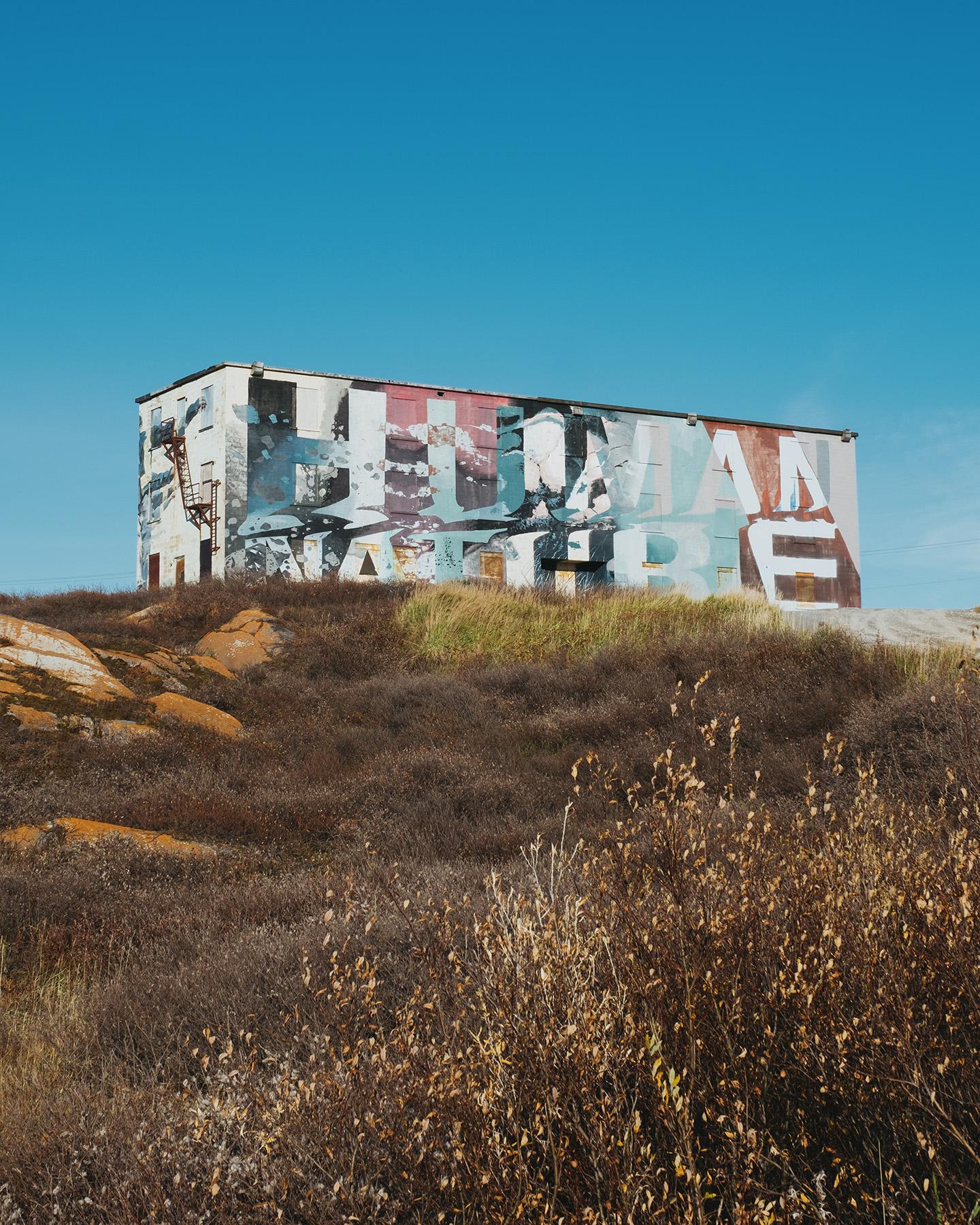 A building with a mural that says Human Nature near the Port of Churchill in Churchill, Manitoba on September 25, 2026.