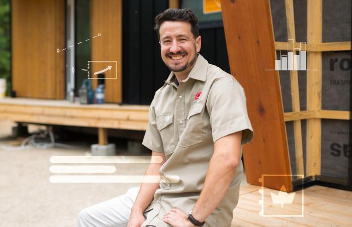 Logan Ashley wears a beige uniform at a Good Way Homes site in B.C.