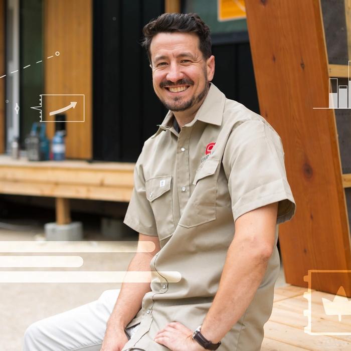 Logan Ashley wears a beige uniform at a Good Way Homes site in B.C.
