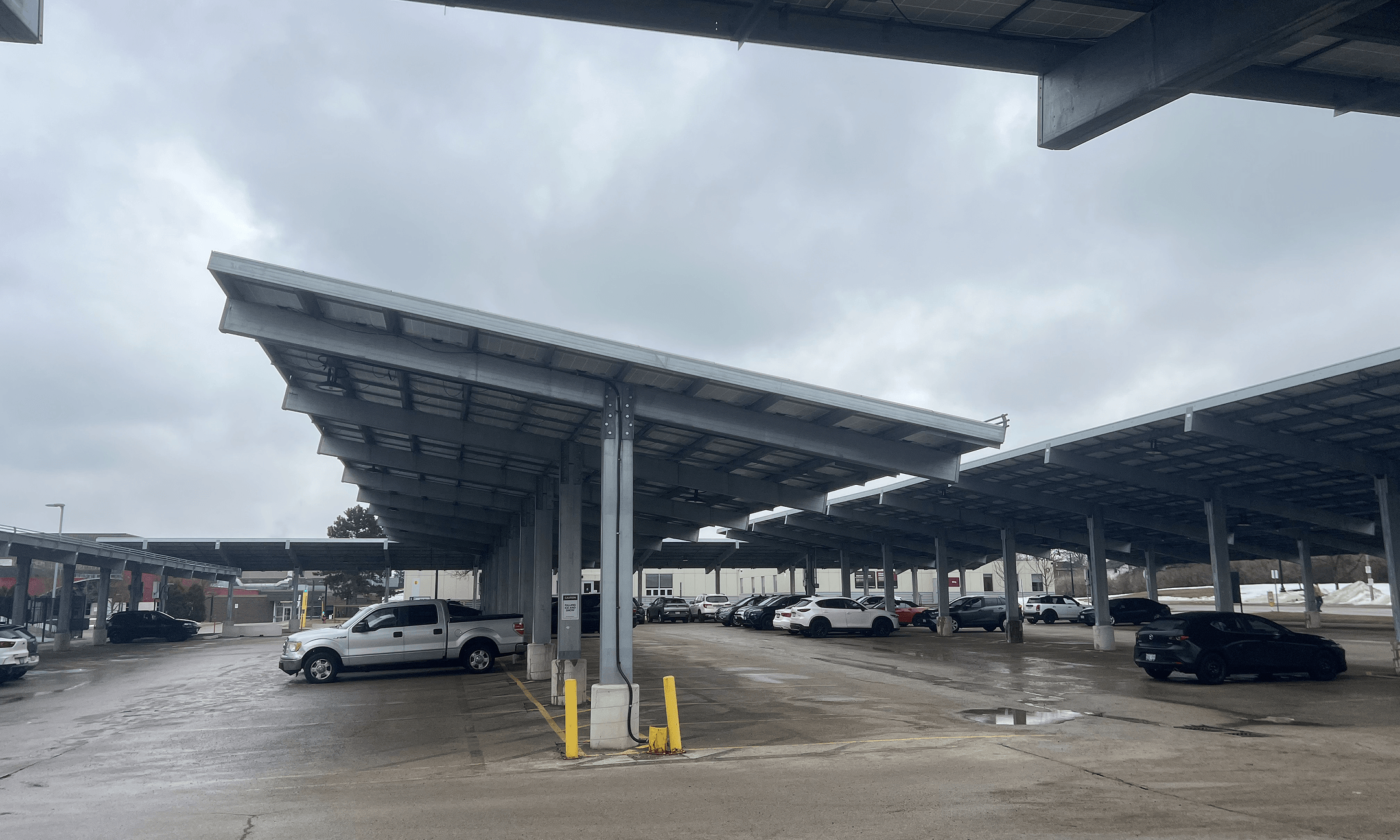 Solar carports like the ones at Mohawk College generate clean energy, cut carbon emissions and help mitigate urban heat islands. They also protect cars from the weather.