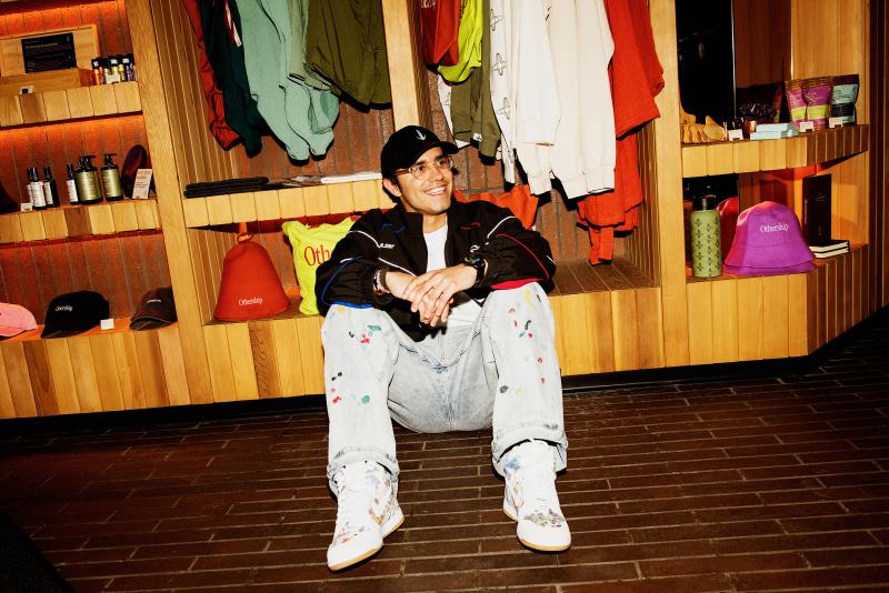 Swish Goswami sitting on the floor of an Othership