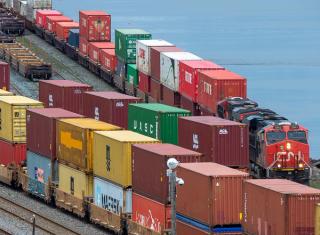 Shipping containers are moved from the Fairview Cove Container Terminal In Halifax on Tuesday, May 11, 2021. THE CANADIAN PRESS/Andrew Vaughan