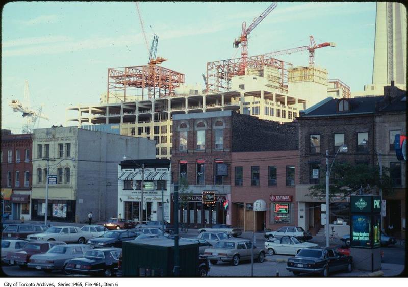 A ’90s-era image of buildings under construction in downtown Toronto. “I-beams,” writes Jennifer Wells, ”are synonymous with structural steel construction, with sky-breaching skyscrapers.”