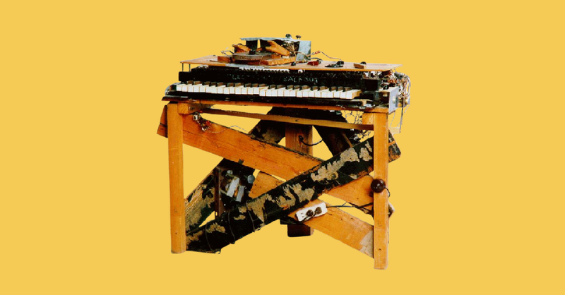 electronic sackbut on yellow background