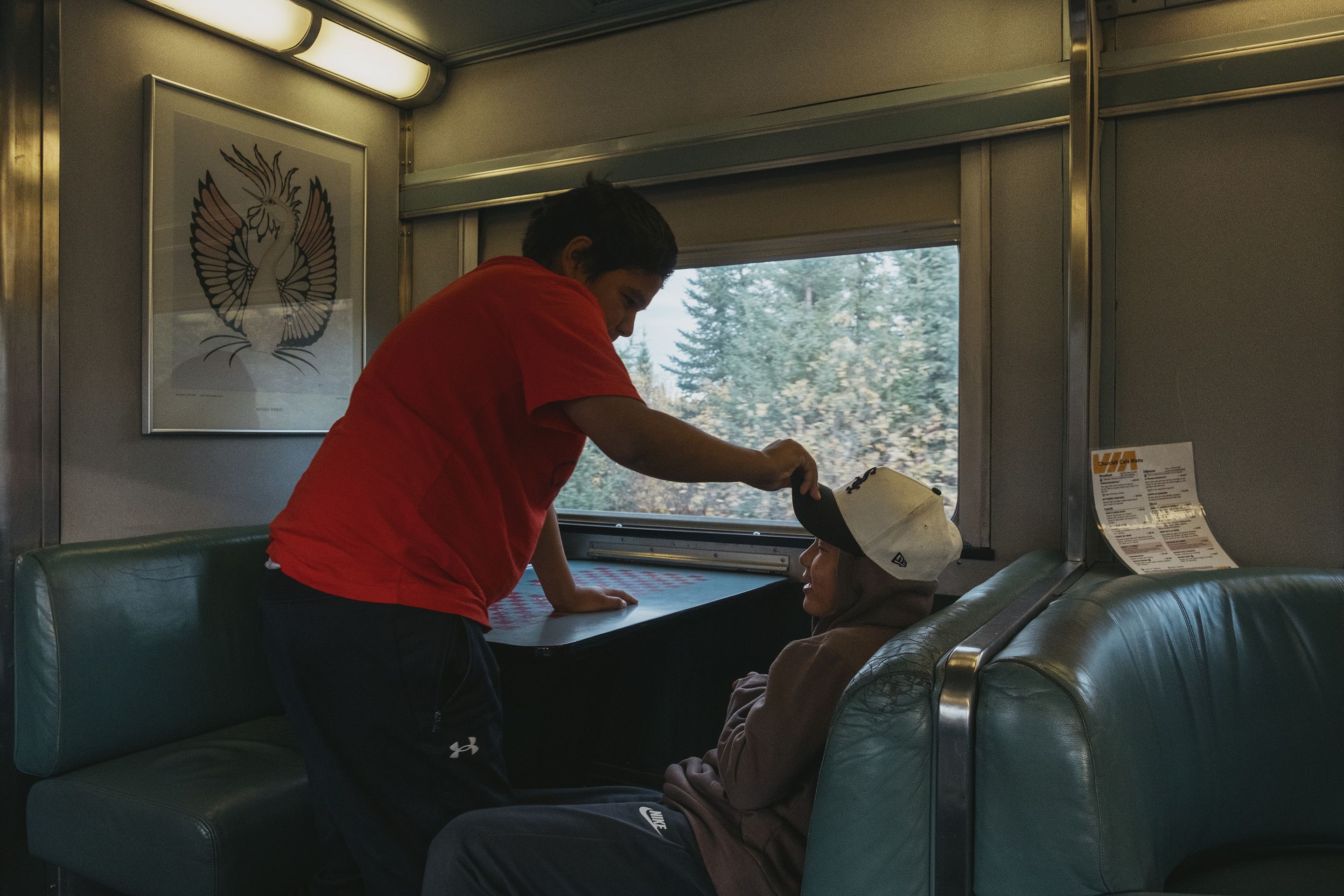 Kids play in the dining car on the train between Churchill and Thompson, Manitoba on September 27, 2026.