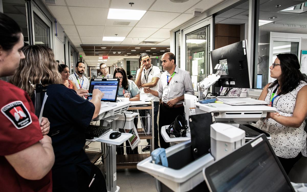 Dr. Prakesh Shah speaking to a group of healthcare workers at Mount Sinai Hospital.