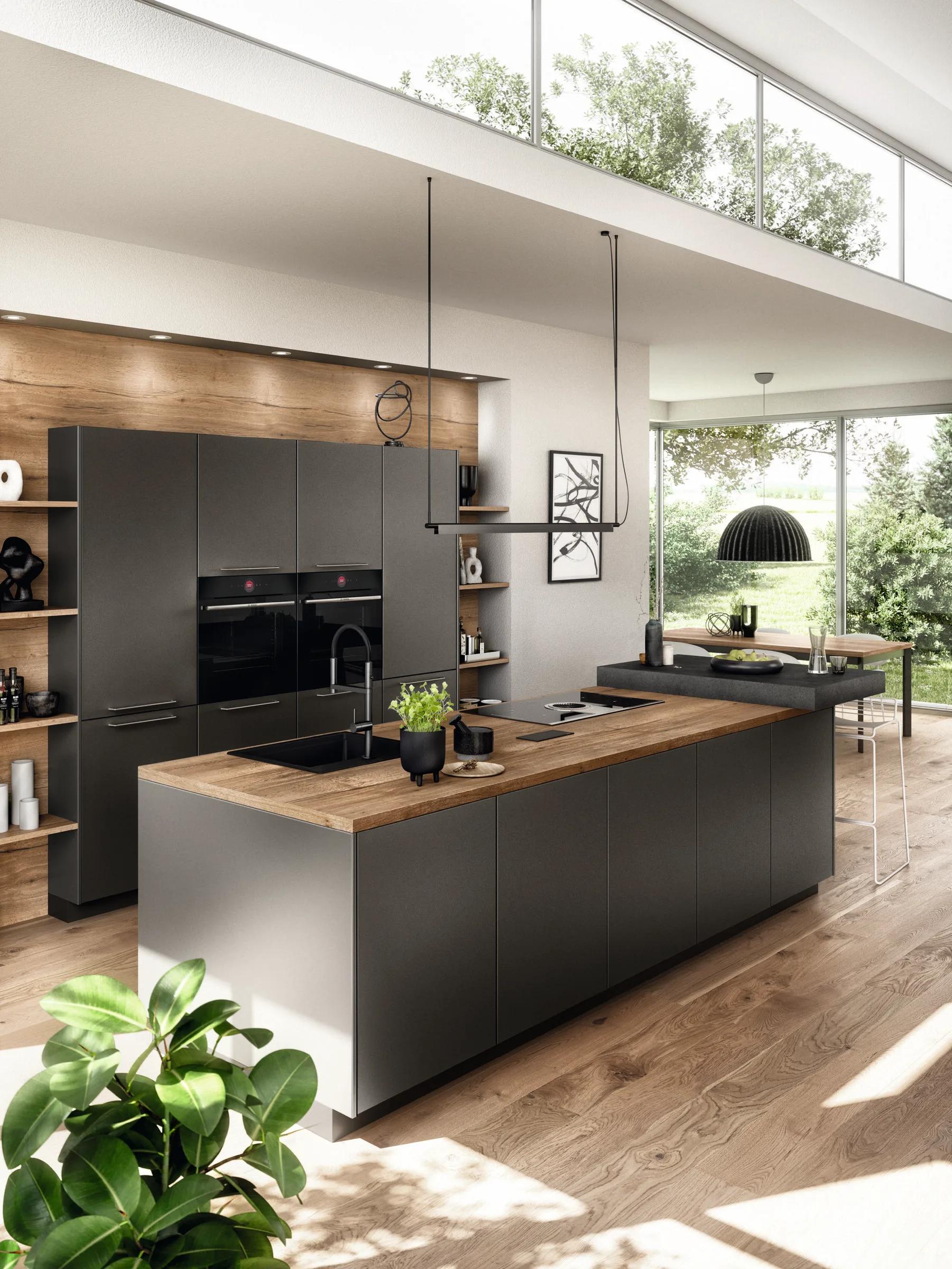 Nobilia Artis 937 moderne eilandkeuken in diep saliegroen met warm eiken werkblad