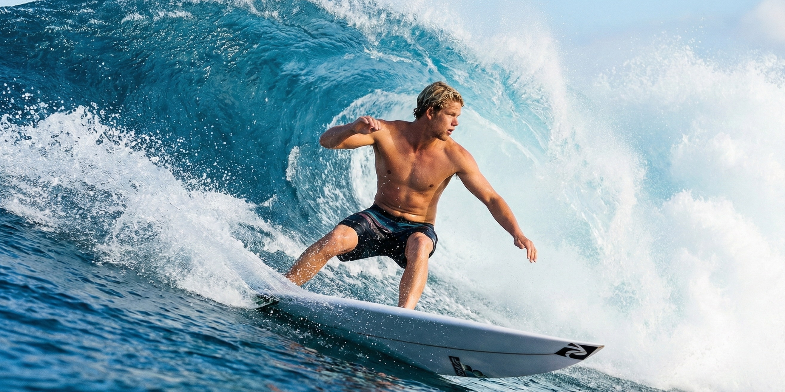 A surfer performing a roundhouse cutback