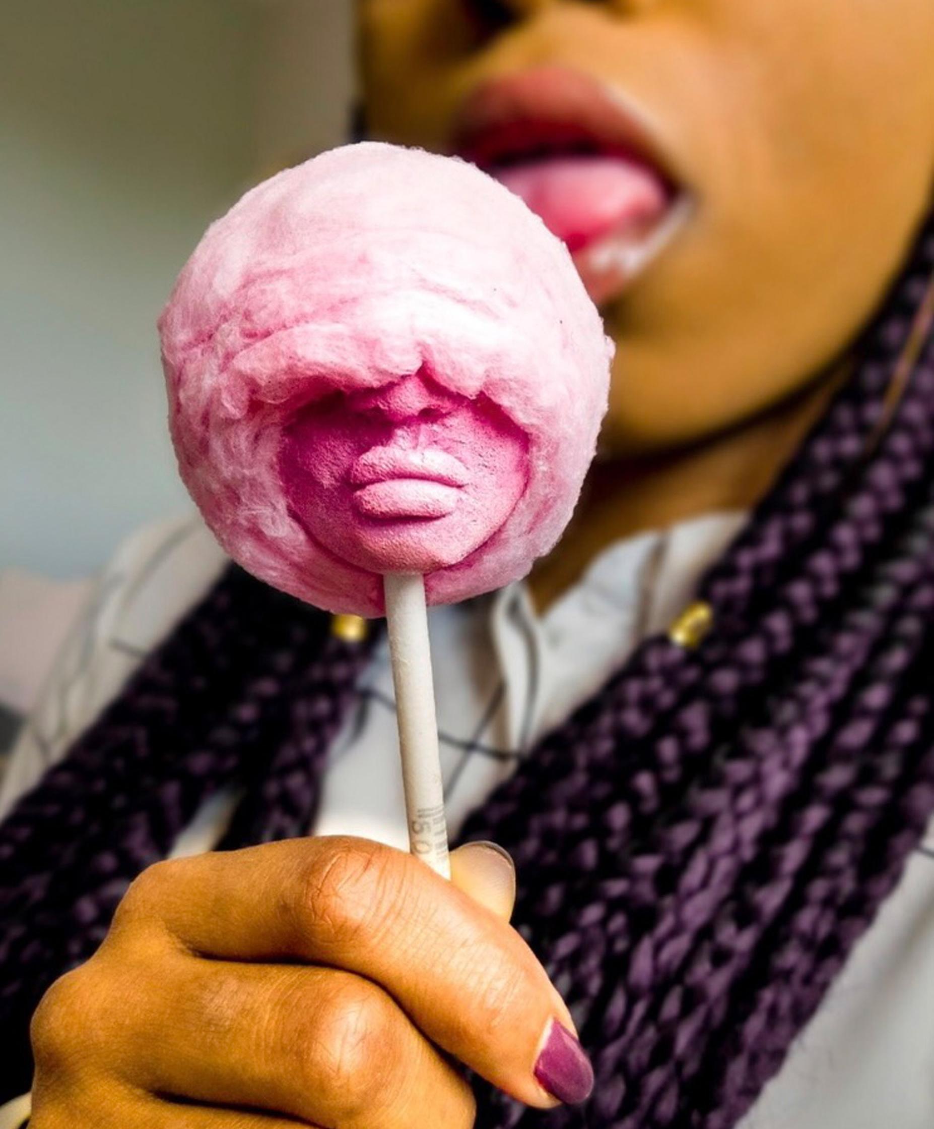 Candyfloss lolly with a face sculpted into it by Lauren-Marie Haywood.