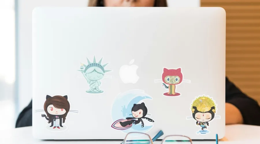 Laptop with stickers of GitHub mascots