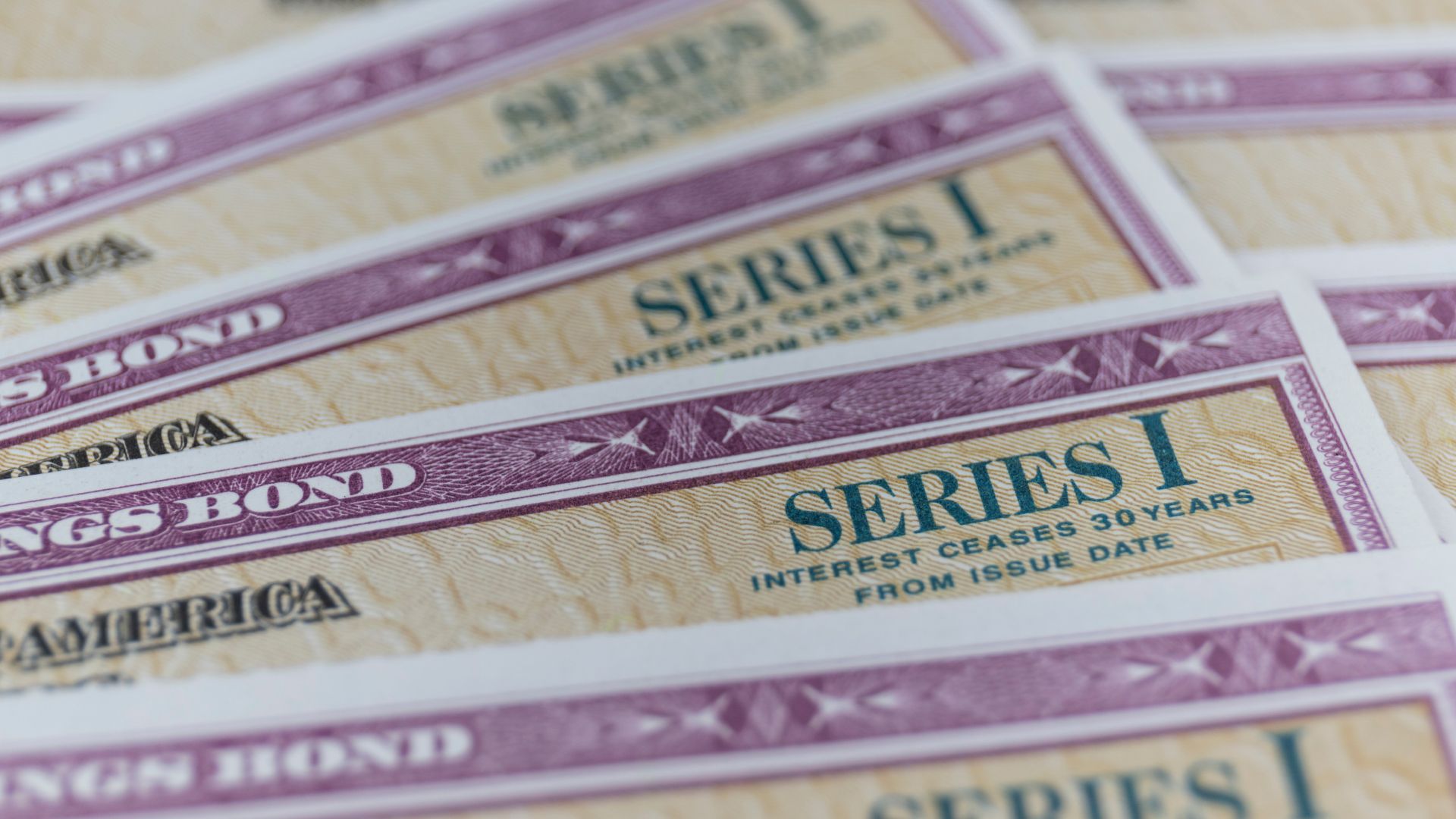 Stack of series 1 savings bonds.