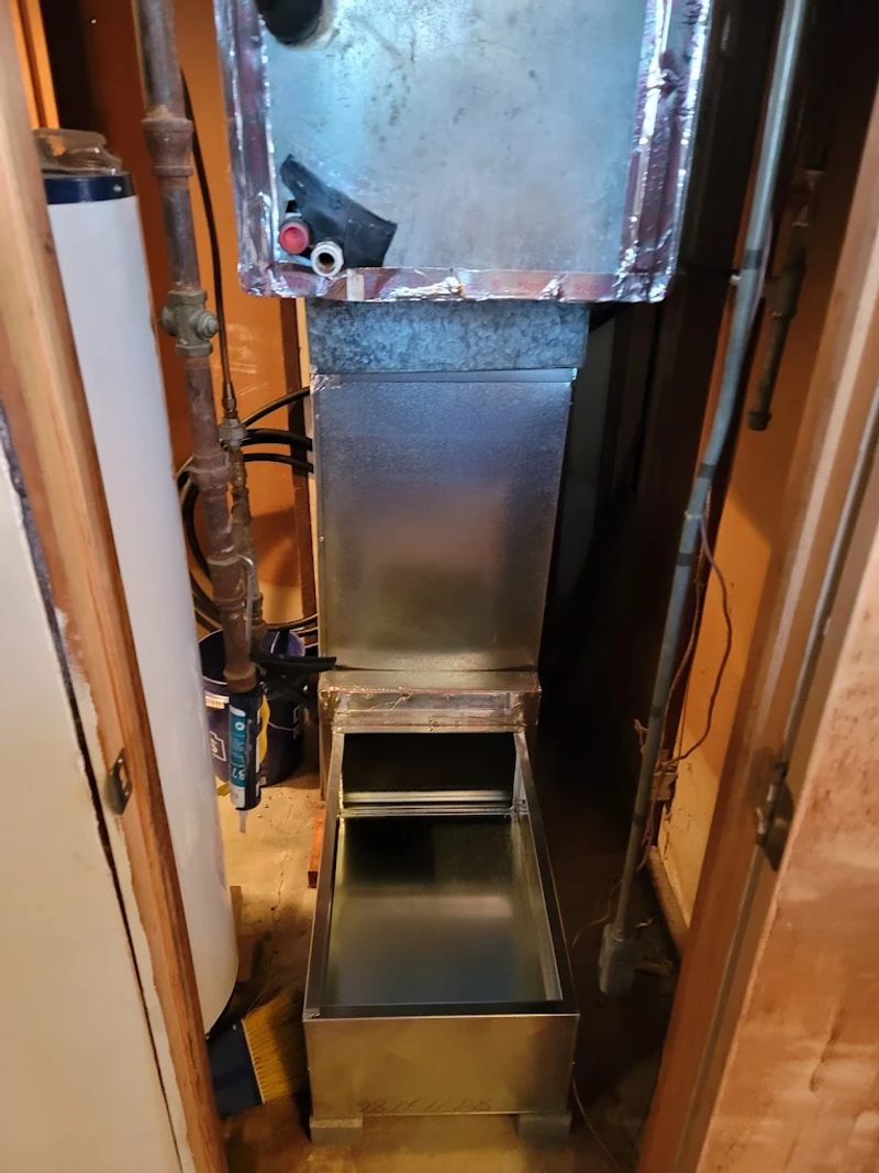 High-efficiency furnace with newly fabricated supply plenum installed by Watson Heating + Cooling