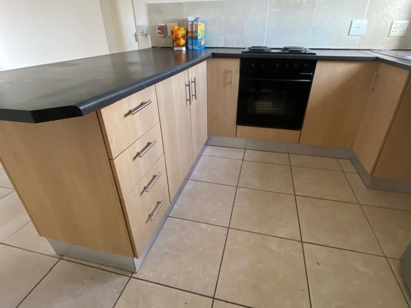 Custom Kitchen Cupboard & Backsplash Installation after renovation