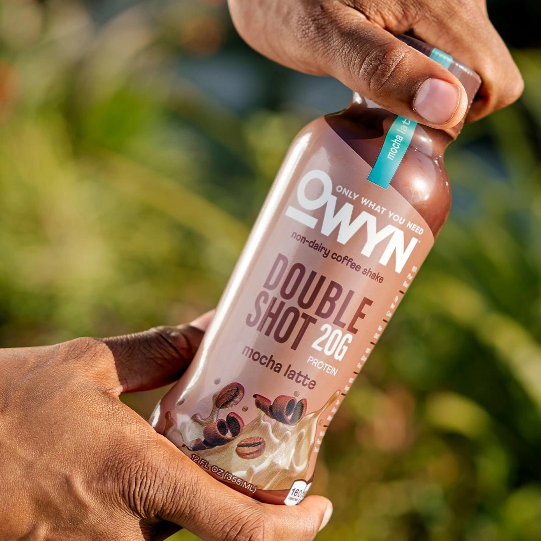 Man holding Doubleshot Coffee Protein Shake