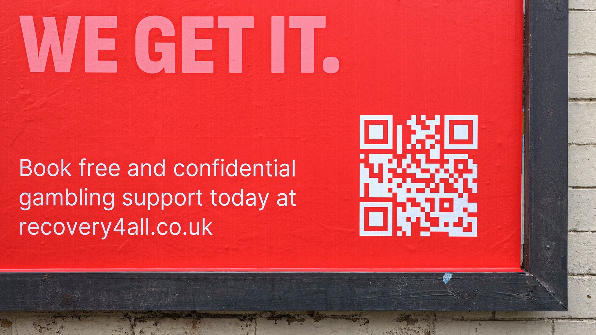 Awareness campaign billboard by Ara Recovery For All in Bristol and Cardiff, close up of the poster highlighting the messaging 'We get it' and the call to action to go to the website and the QR code