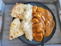 Any Chicken Curry on Rice + Naan $12.00