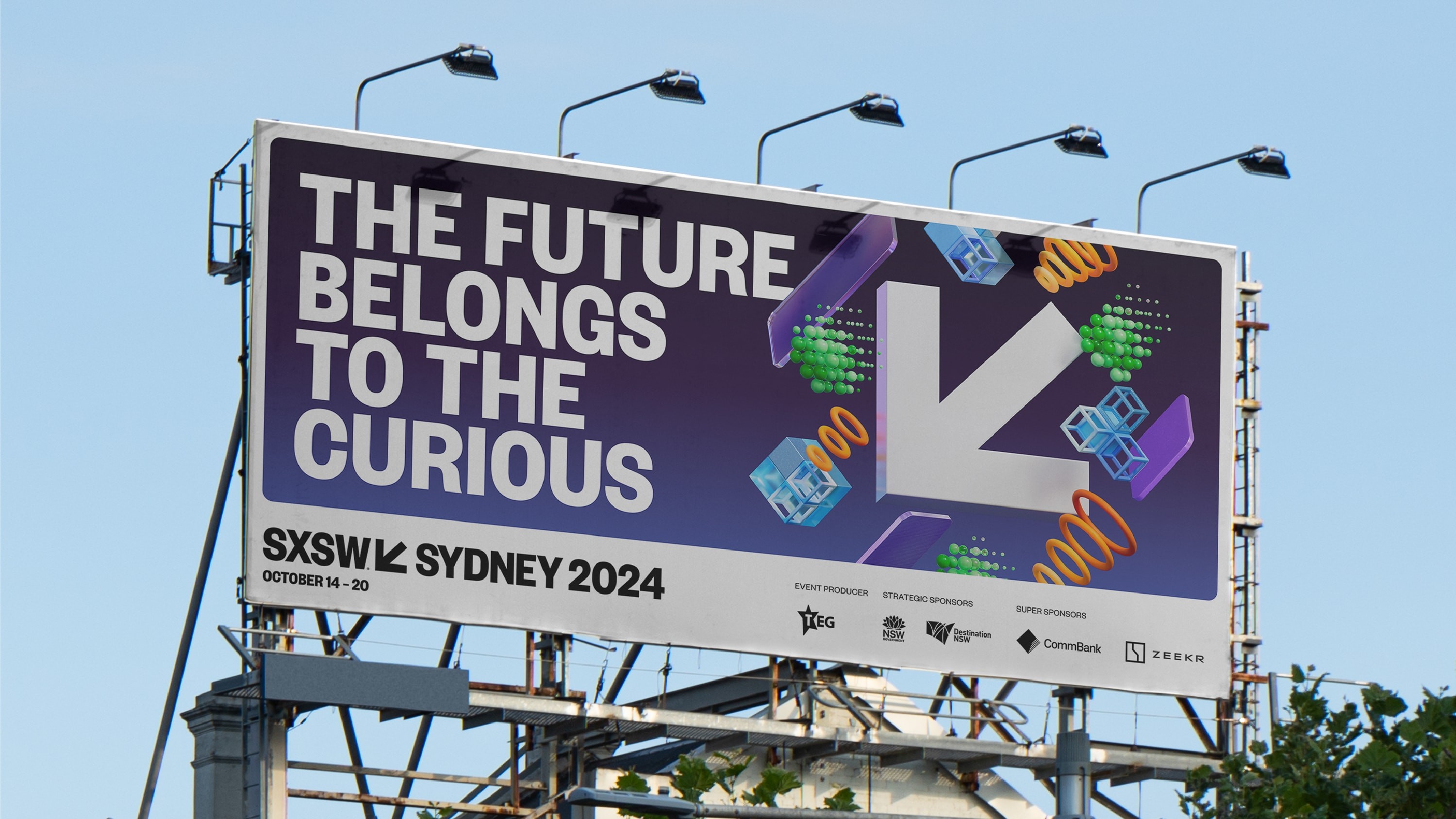 Billboard with heading 'The future belongs to the curious' with floating arrow and 3D objects.