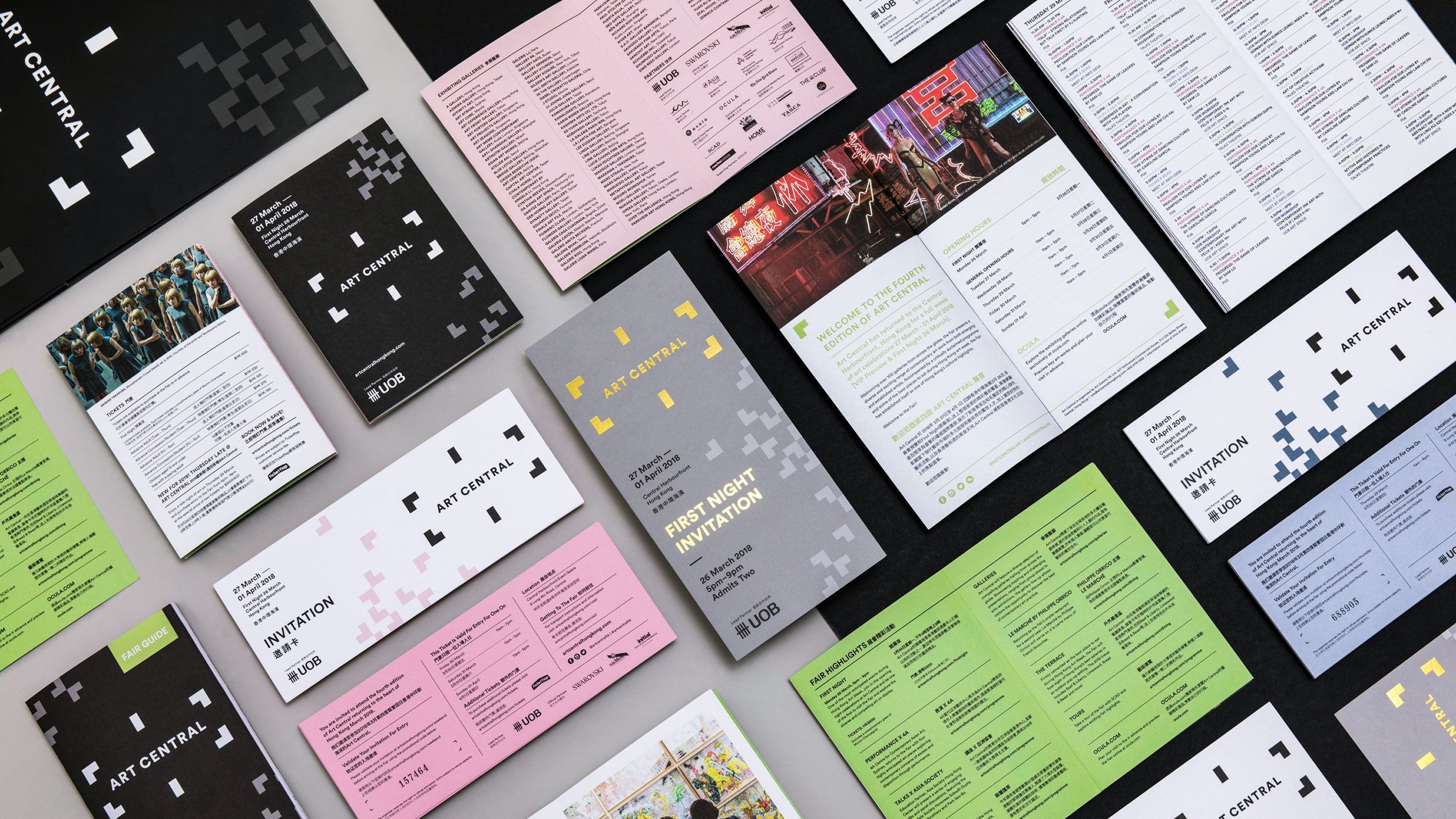 A range of printed event collateral being showcased together. 