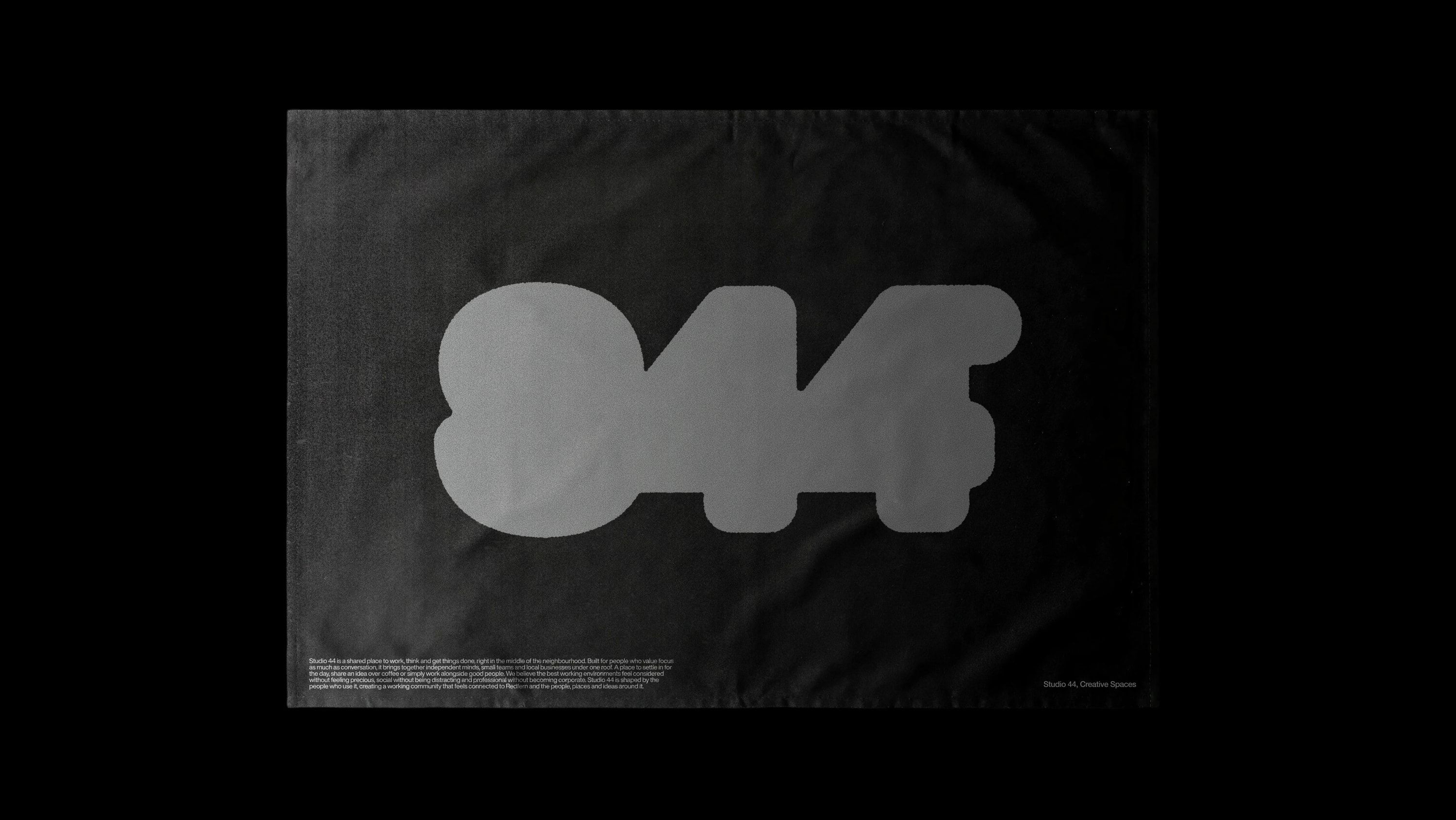 Mockup: A flag featuring one of the abstracted versions of the logomark.