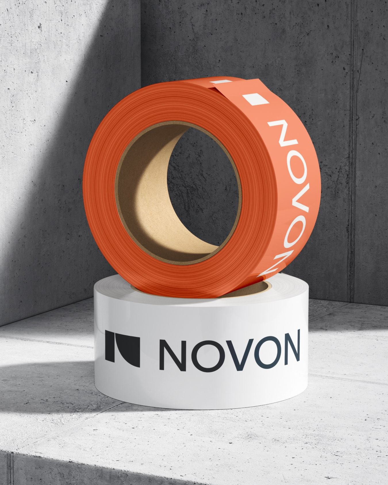 Two rolls of branded tape.