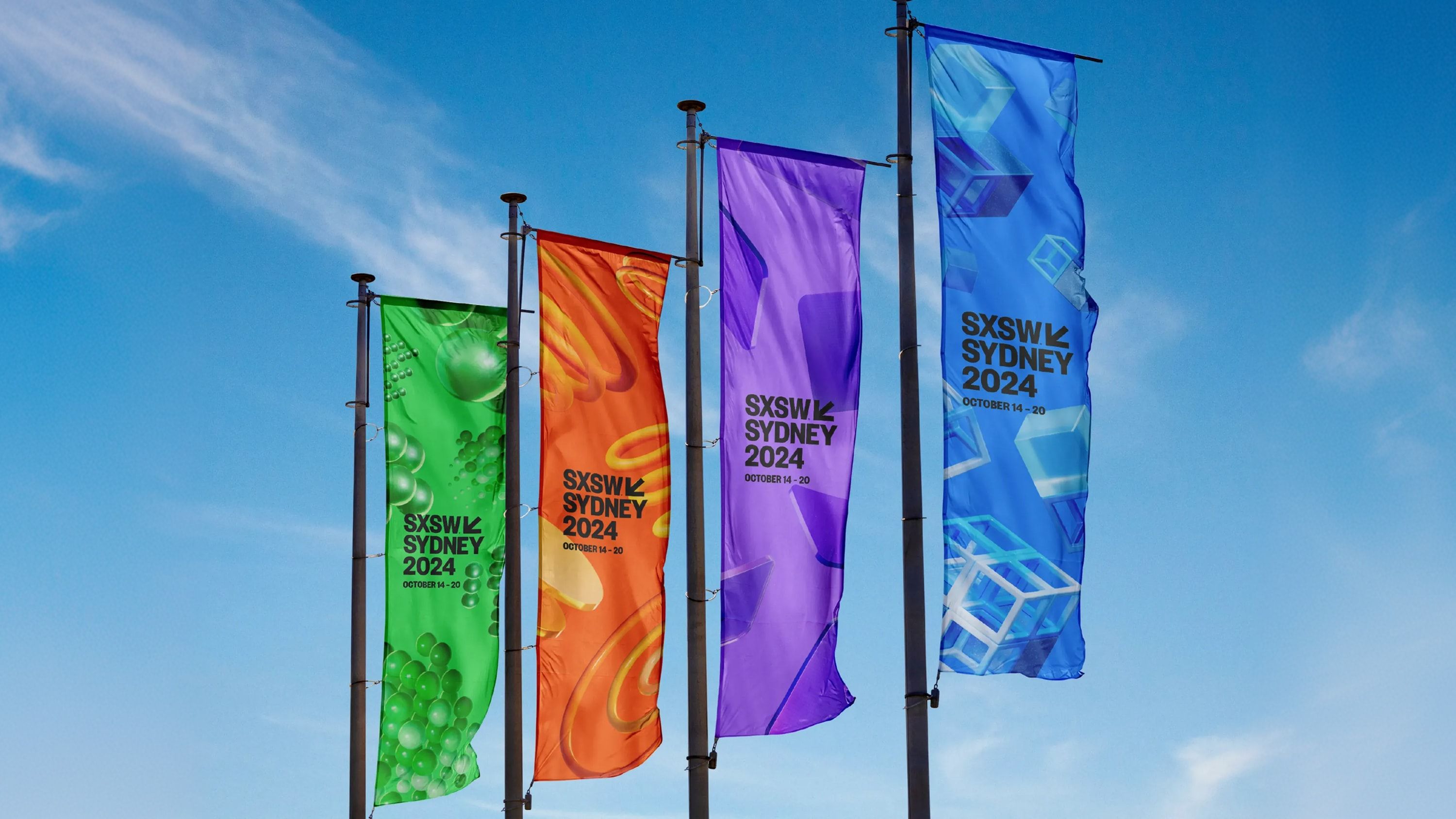 Flags with the logo and different coloured 3D objects.