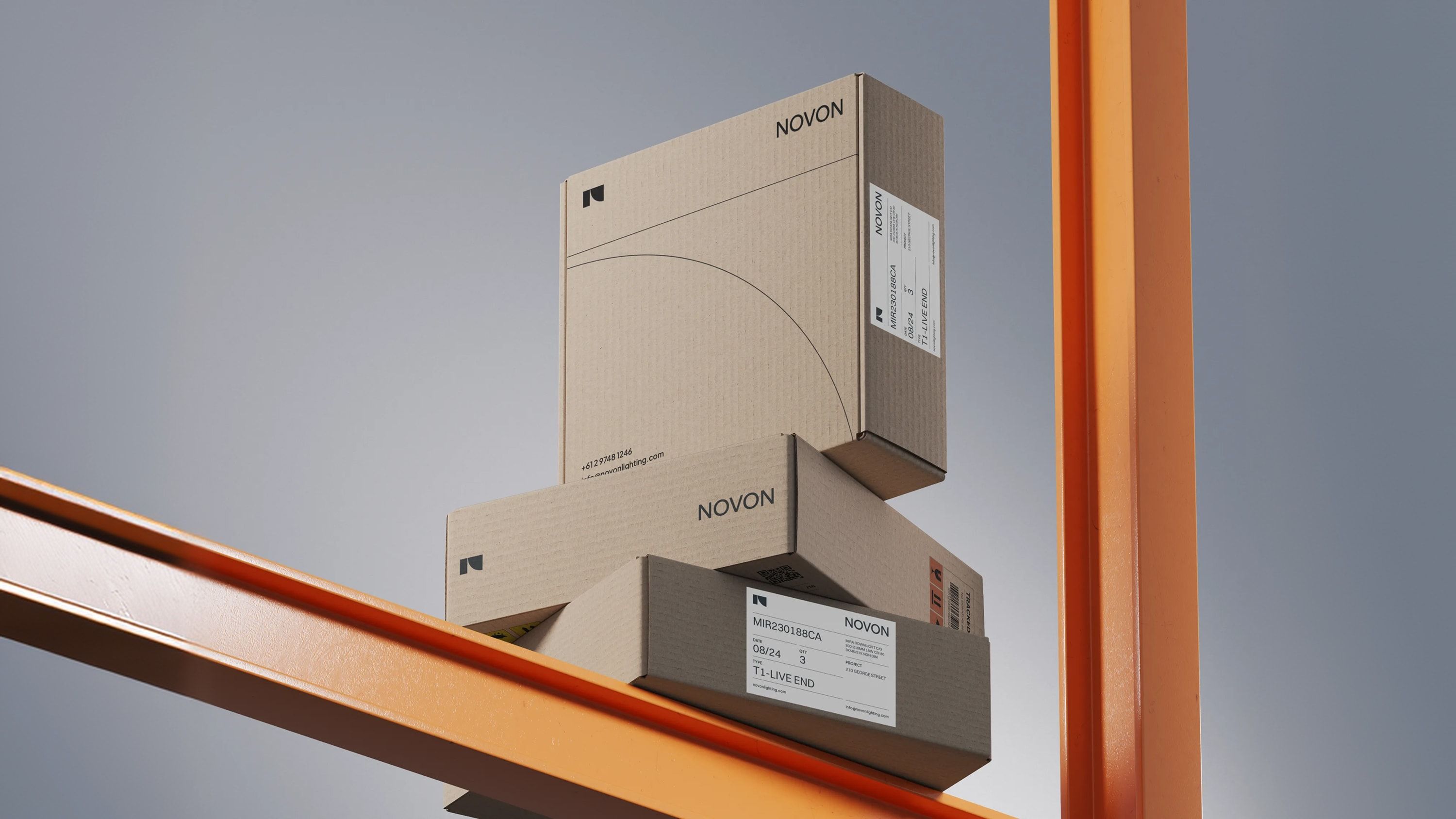 3 branded boxes sat on top of metal poles.