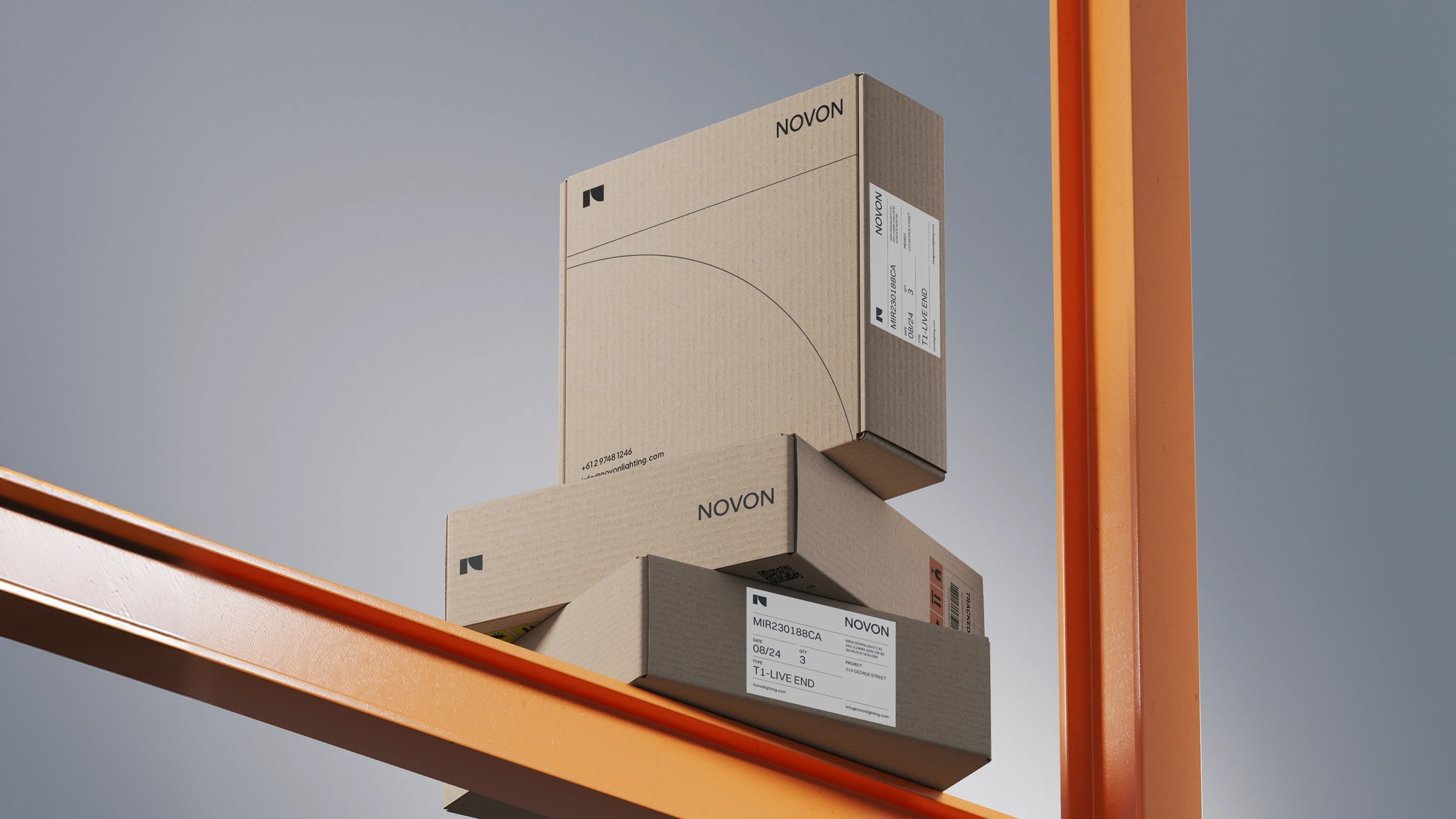 3 branded boxes sat on top of metal poles.