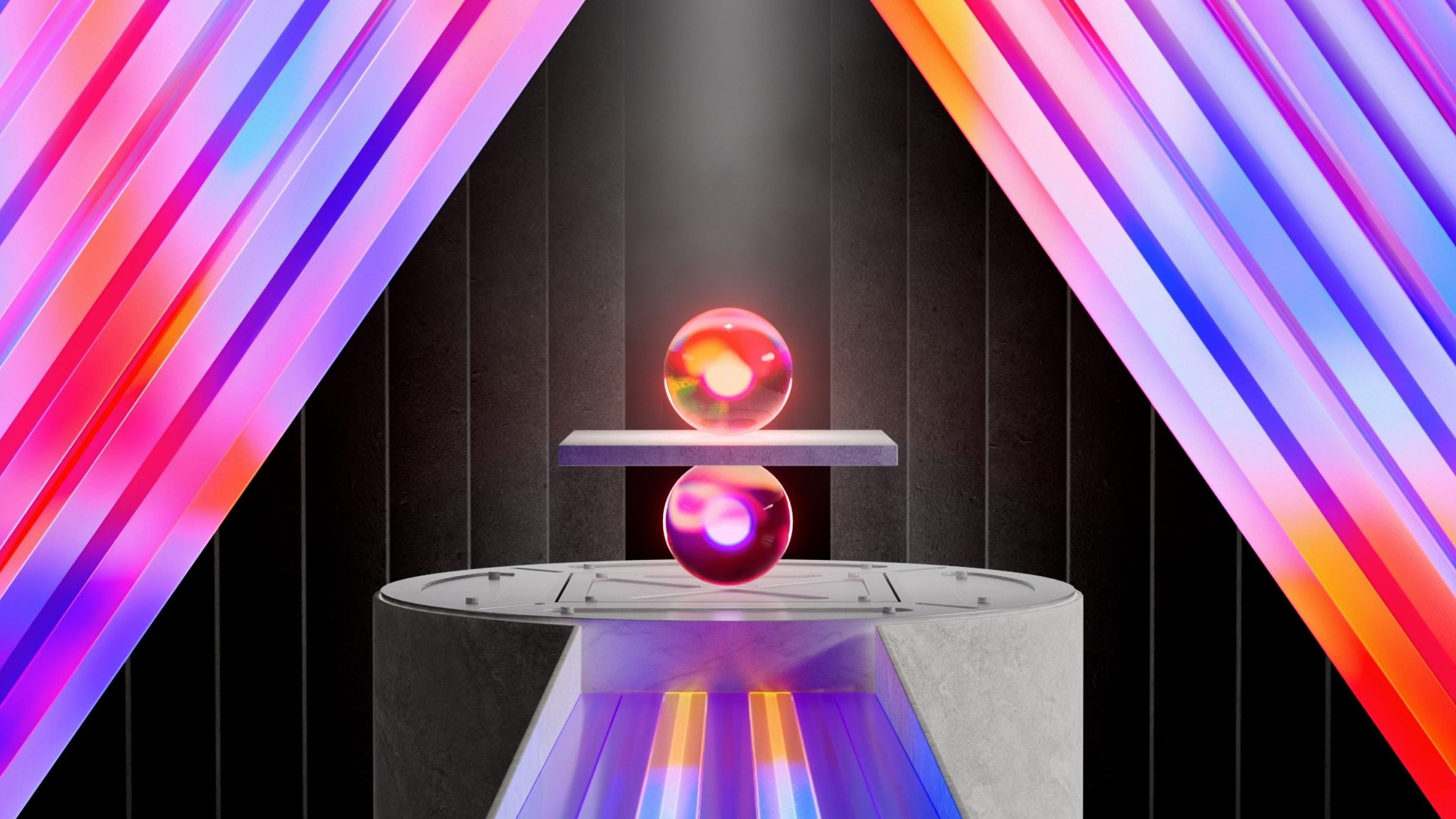 Two spheres balacing on one another, separated by a block.