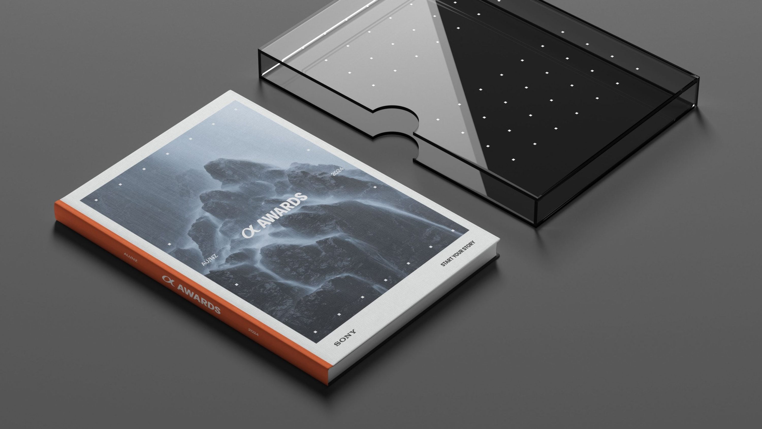 Book for the Sony Alpha Awards with a translucent cover.