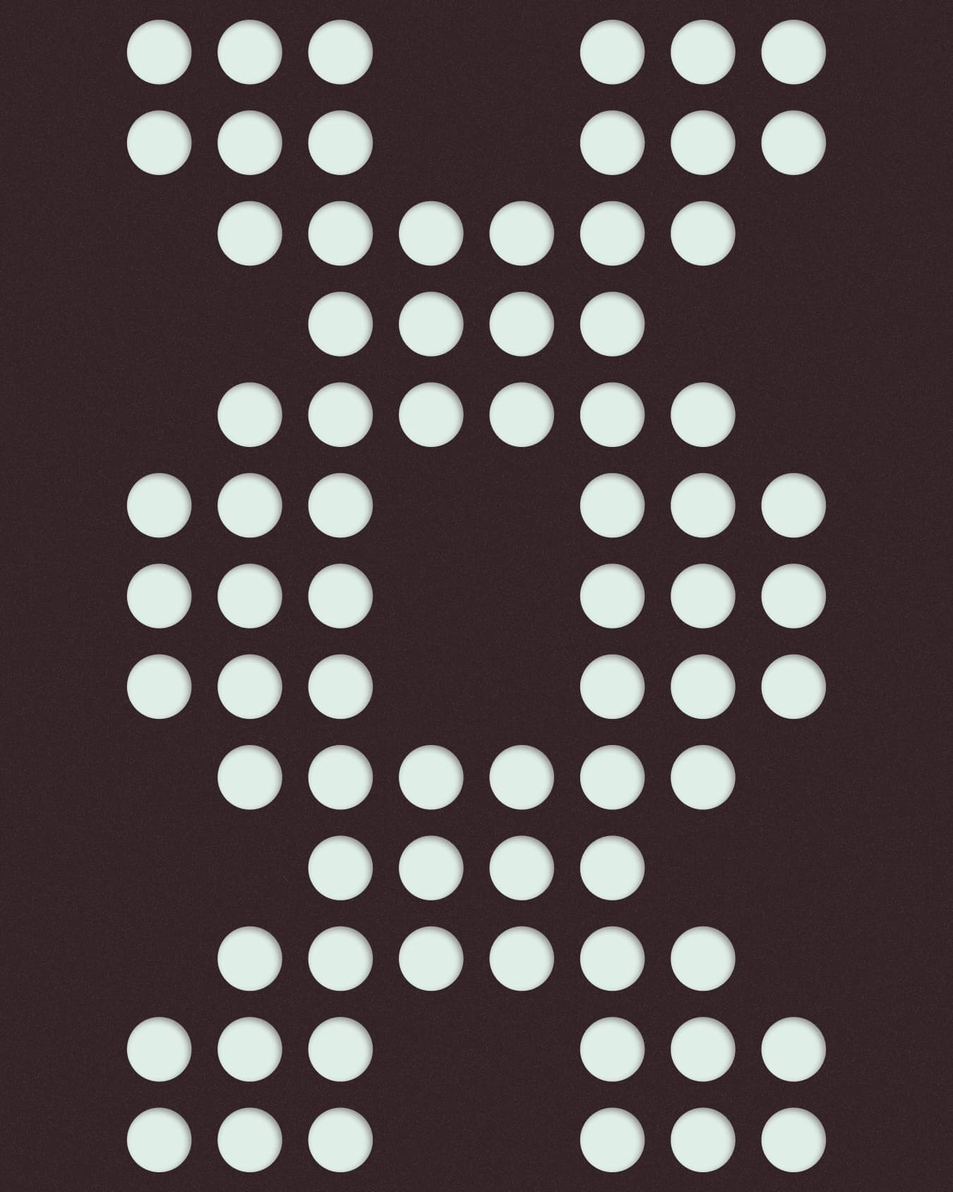 Symmetrical mint circle pattern narrowing at the centre on dark brown.