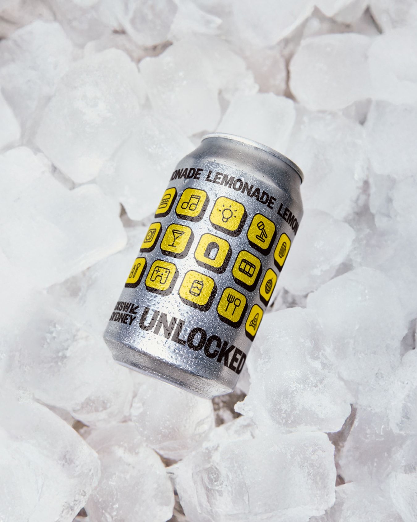 Can of lemonade with yellow tiles and logo.