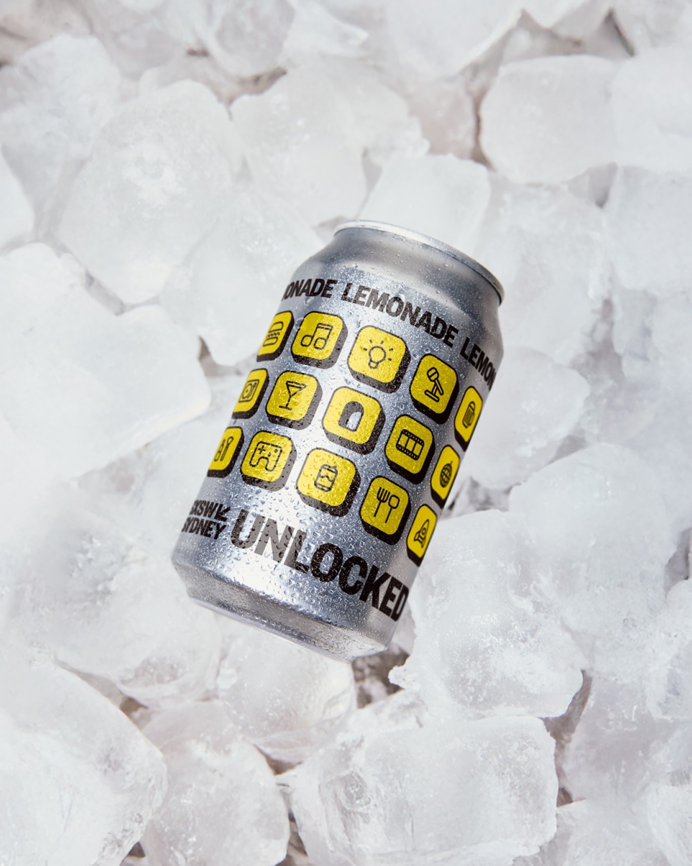 Can of lemonade with yellow tiles and logo.