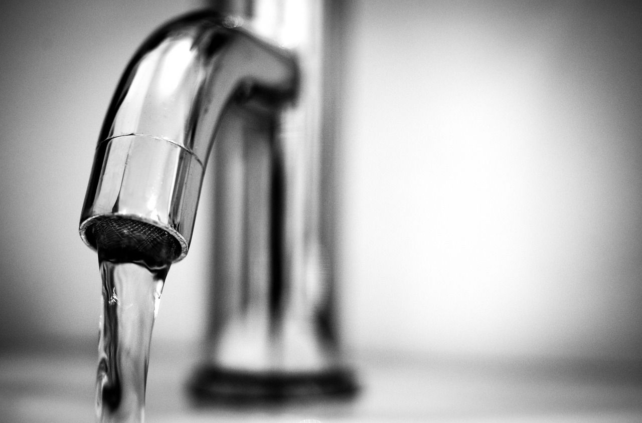 Close-up of water dripping from a faucet