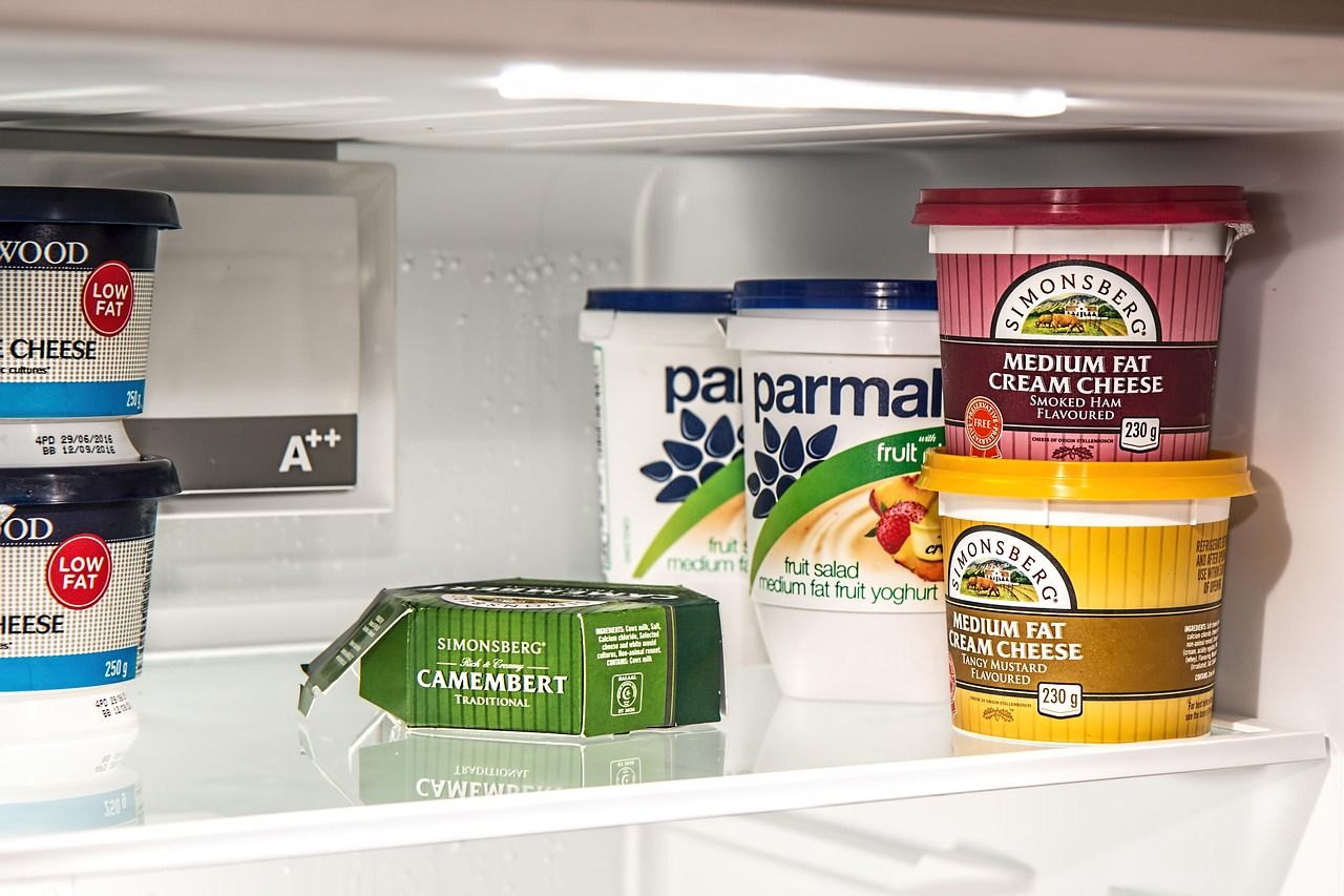 Household refrigerator in a kitchen