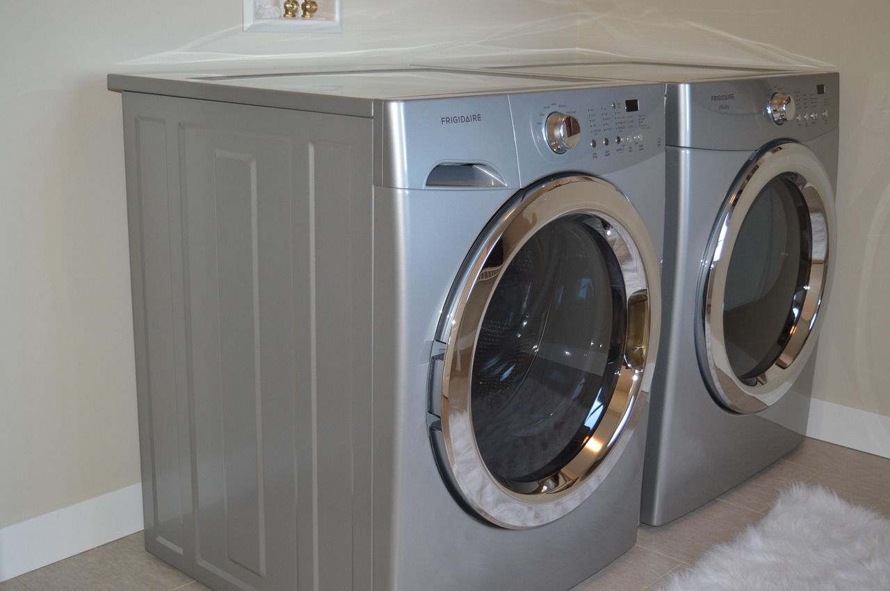 Household washing machine in a laundry area